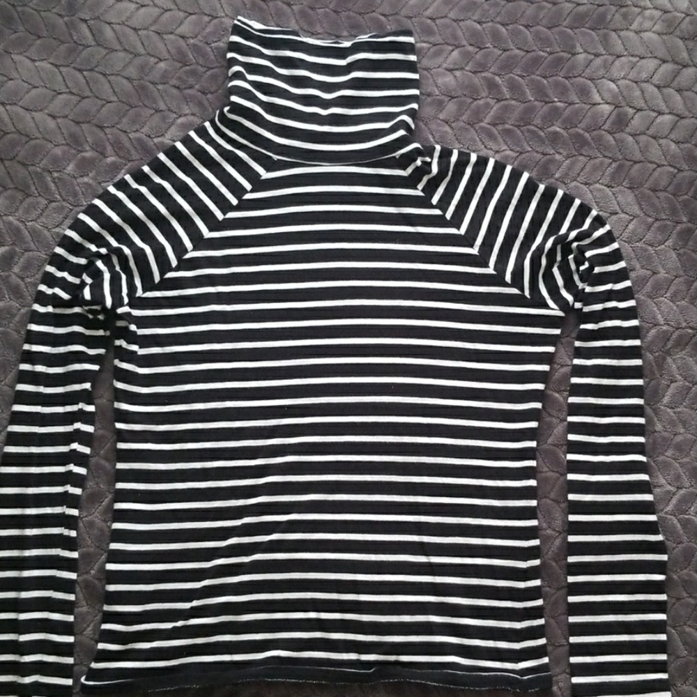 A black and white striped long sleeve turtleneck